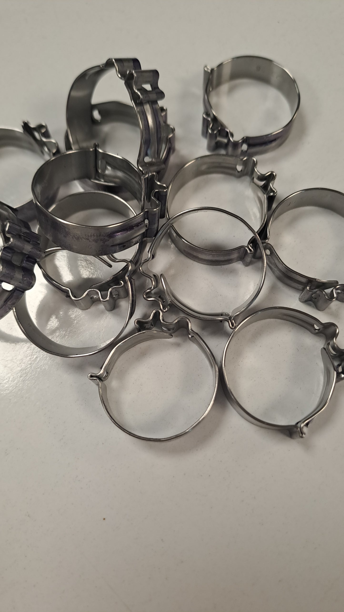 Pushlock stainless reusable Hose Clamps.